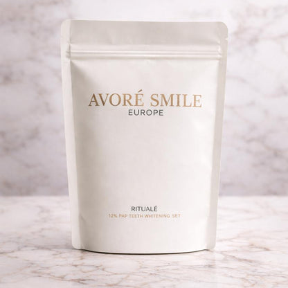 Avoré Smile Europe Ritualé 12% PAP teeth whitening set packaging, luxury non-peroxide dental whitening kit on a white marble bench